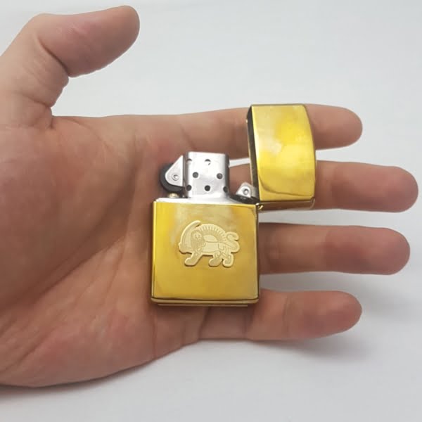 Lion and Sun Zippo Lighter