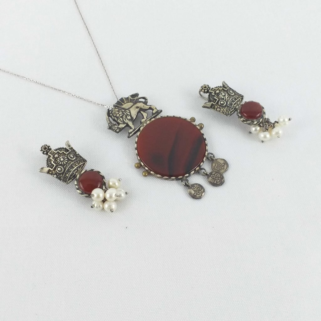 Agate Lion and Sun Necklace From a side angle