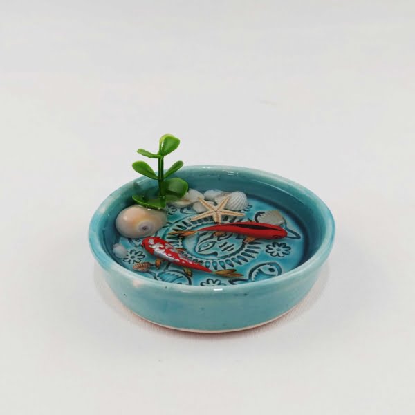 Miss Sun Fish Pond