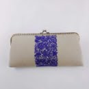 NEEDLEWORK CANVAS CLUTCH, WHITE Handmade structured canvas clutch decorated with needlework inspired by Persian art. Light milky color Size 27 * 13 All-embroidered needlework Fixed color yarn on linen fabric Project Name: Blue Shrub Washable