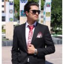 Tie with calligraphic design