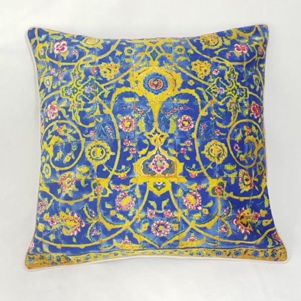 blue and yellow floral cushion