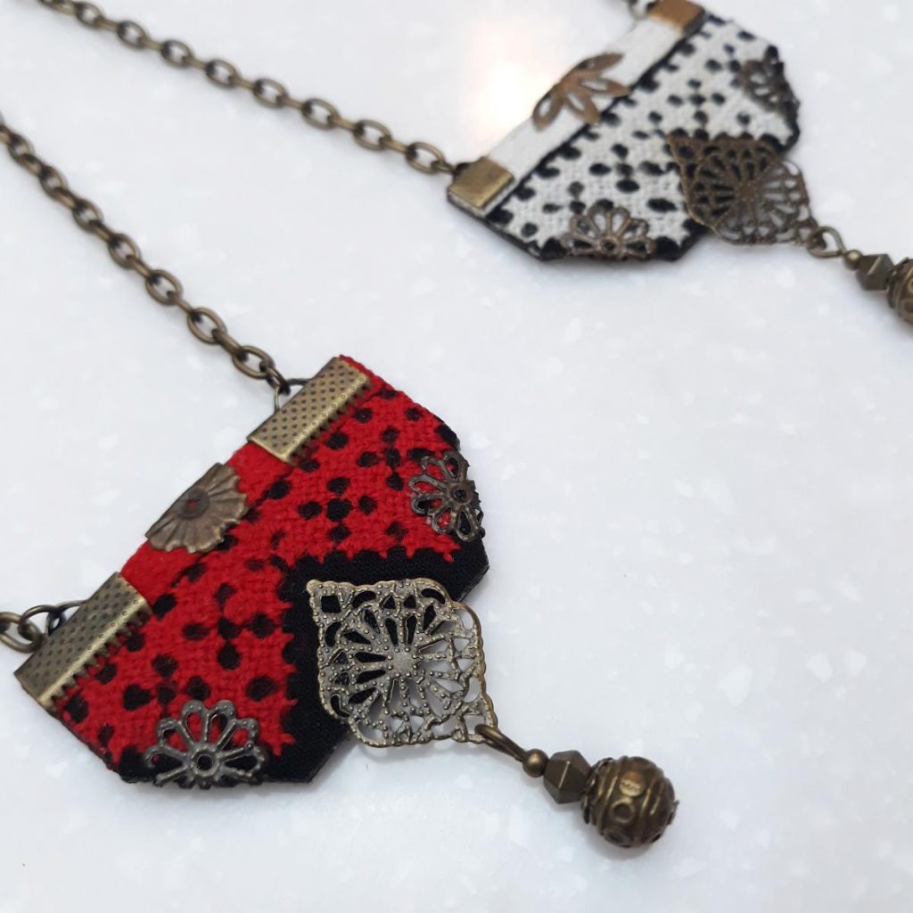 white handcrafted Balochi embroidery necklace with vivid traditional patterns