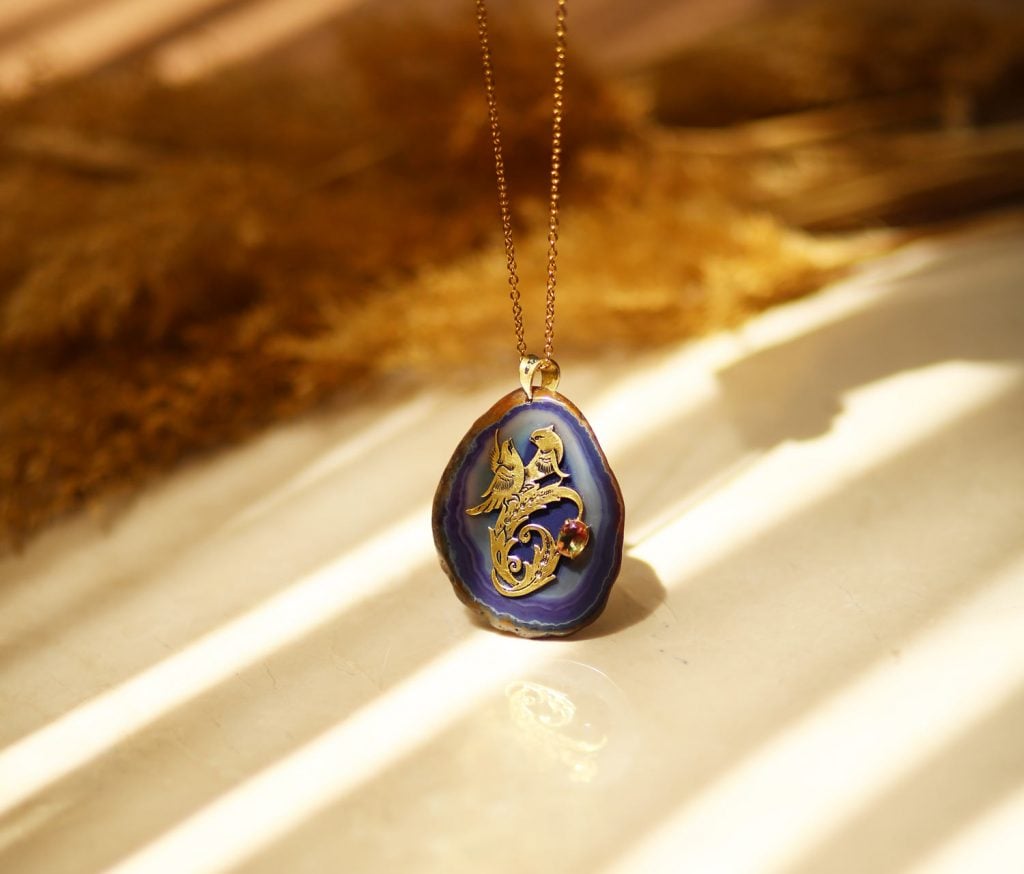 homa Agate golden Necklace on blue stone