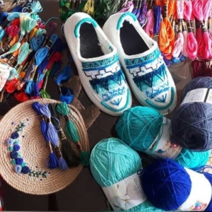 Givah shoes with blue yarn strap