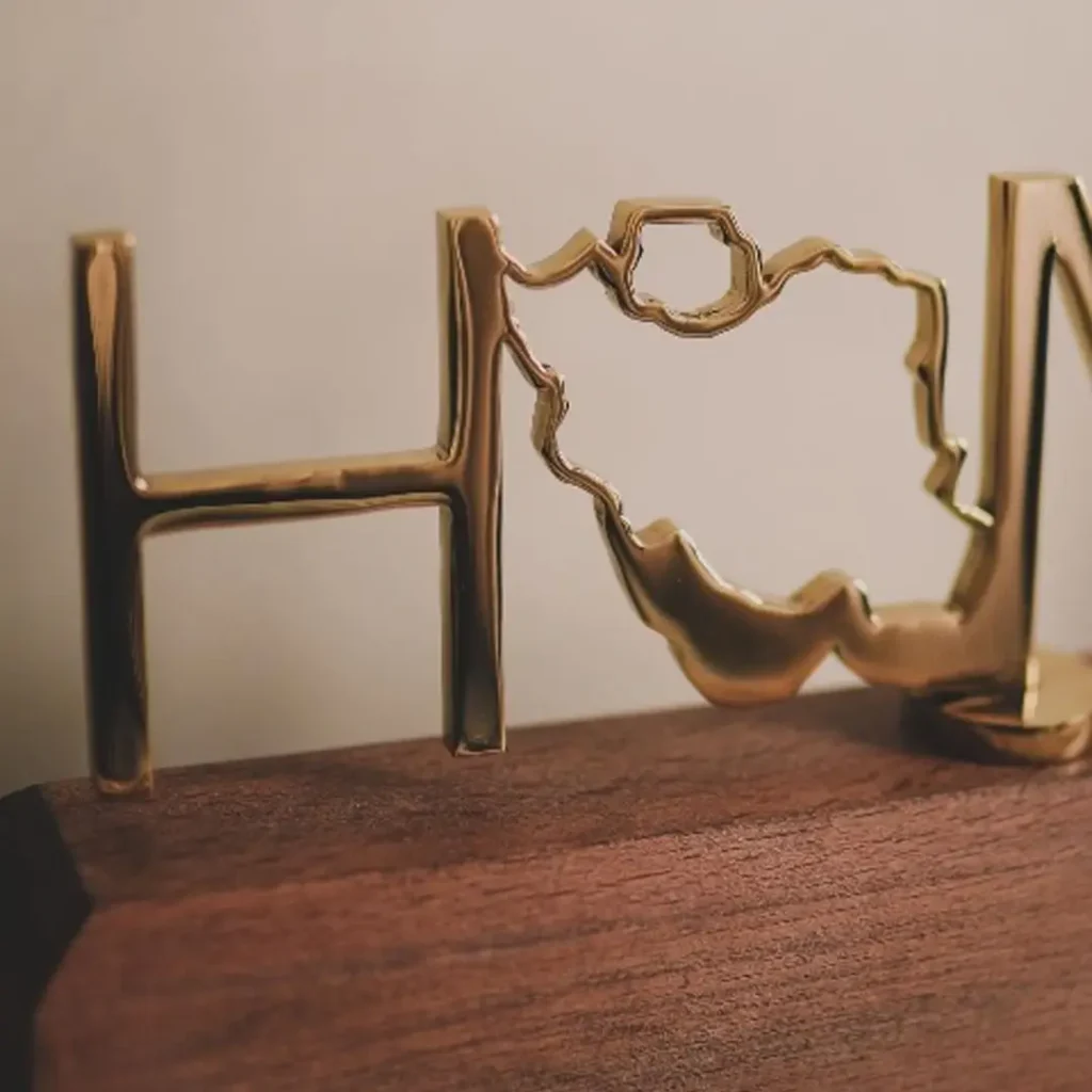 Polished Gold-Plated Home Design Iron Sculpture with Beech Wood Stand