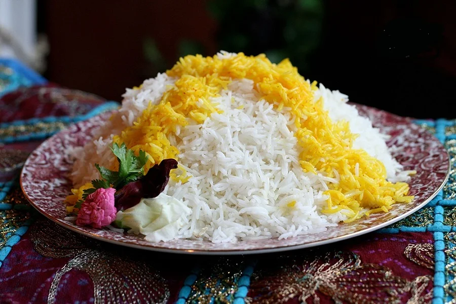 A bowl of saffron rice tinted golden yellow