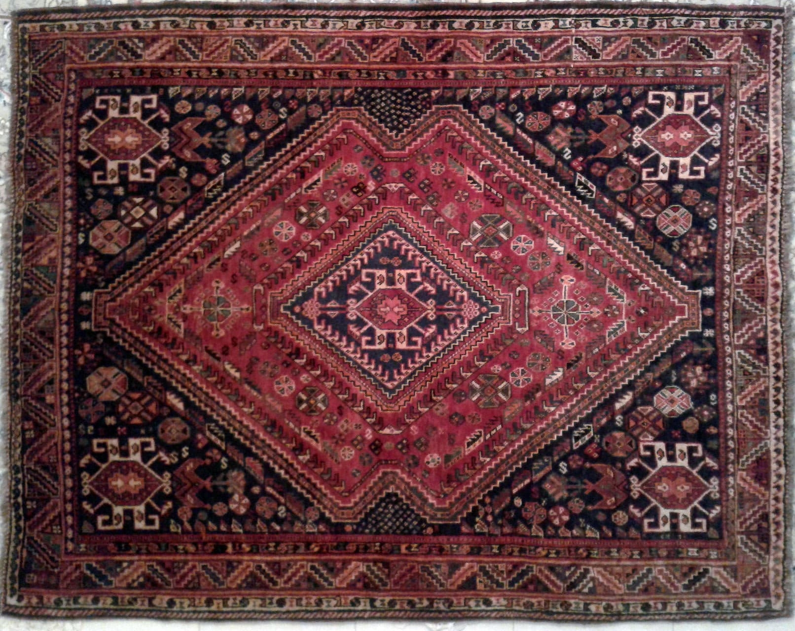Traditional Persian carpet from Shiraz with intricate patterns