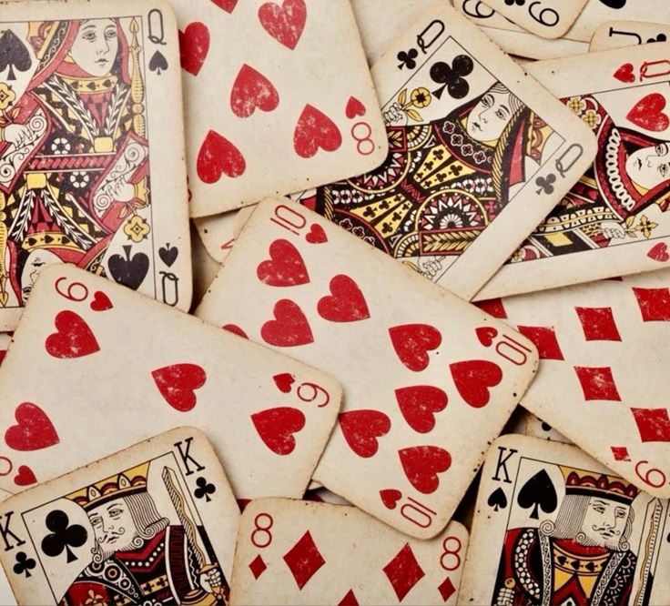 Fortune telling with playing cards spread on table