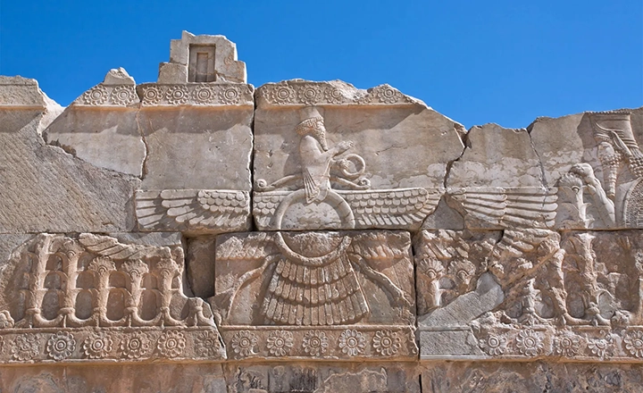 Ahura Mazda or Farvahar symbol of Avesta hall doorway Persepolis Iran