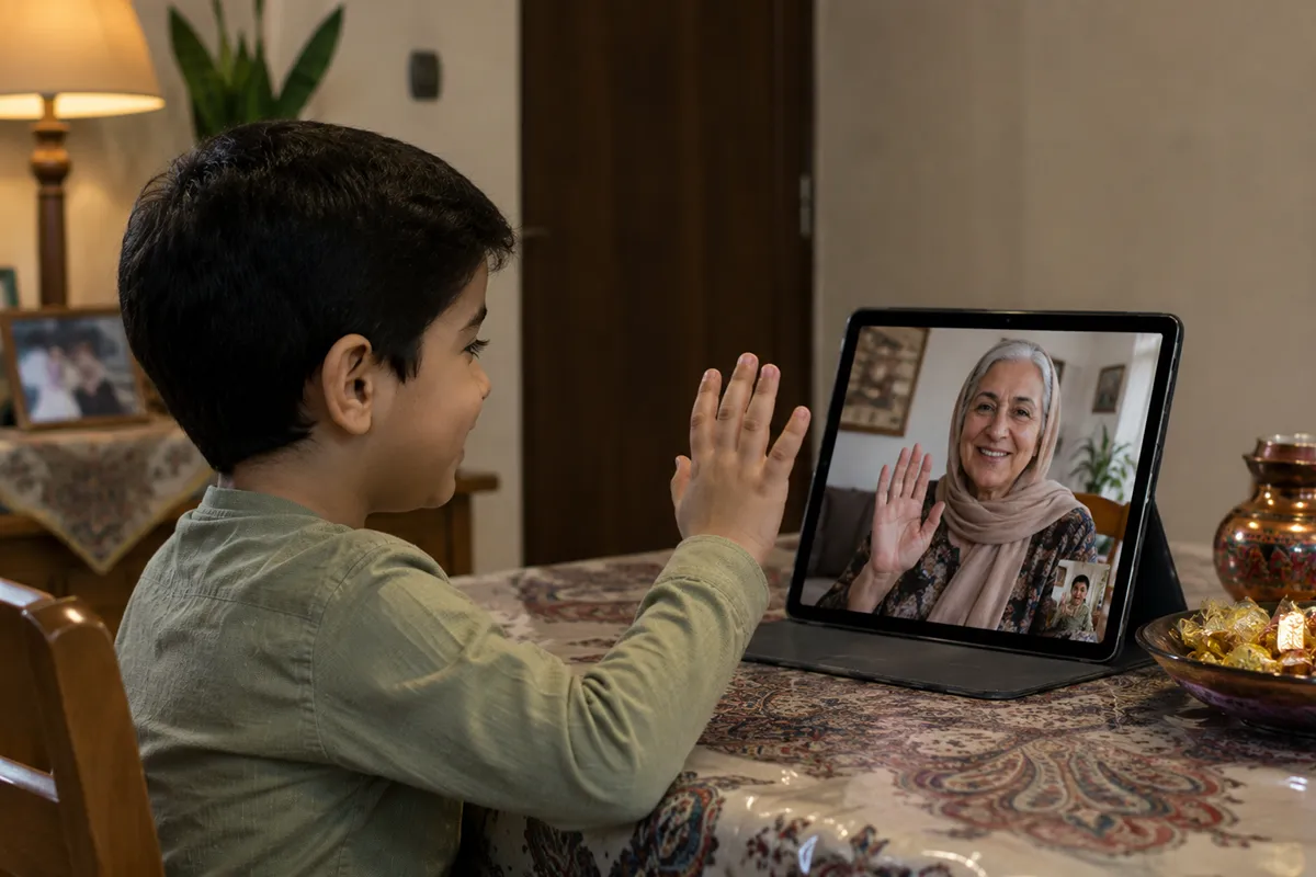 A child video calling a grandparent to stay connected to Persian culture